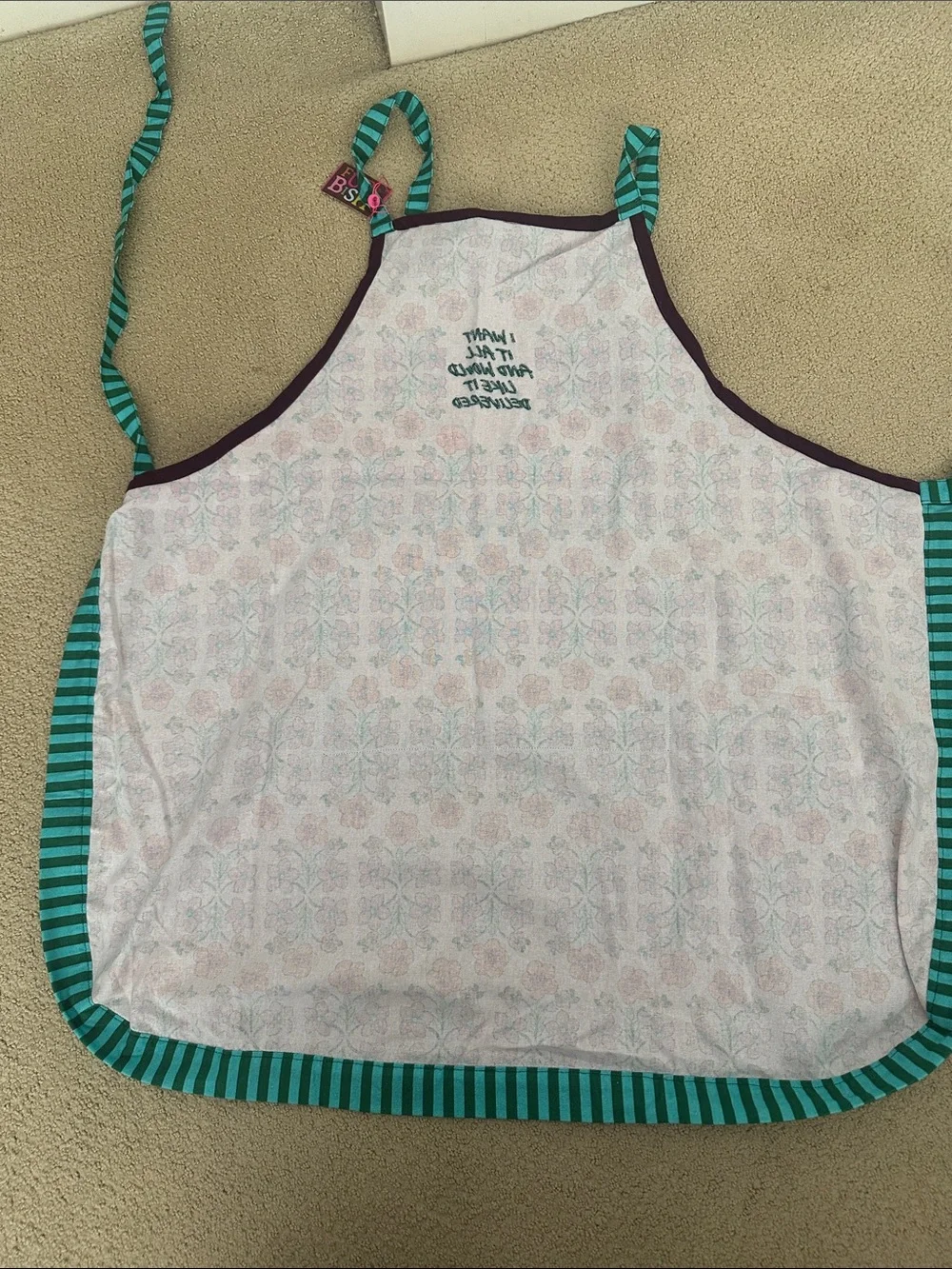 Whimsical Pink Floral Apron with Teal Striped Pocket